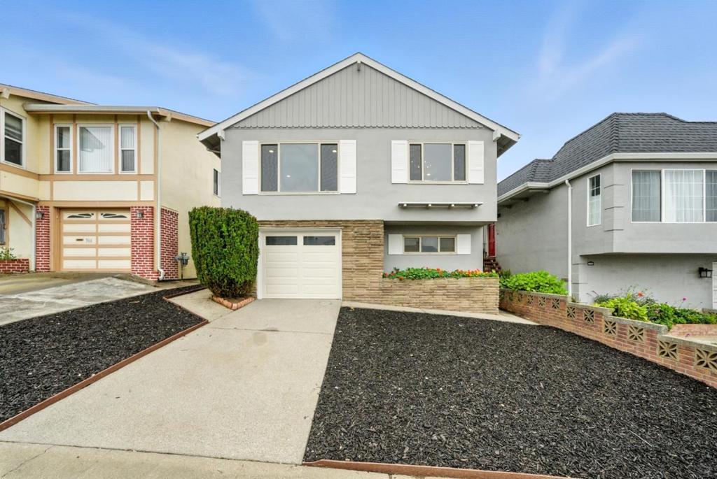 Welcome to this beautifully renovated 1,930 sq. ft. home, offering four spacious bedrooms and two luxurious bathrooms on the main floor. Upon entering, be greeted by a central gas fireplace that warmly unites the living, kitchen, and dining areas with an open layout. The kitchen is a chef's delight with ample countertop space, new cabinets, and stainless steel appliances, illuminated by elegant fixtures. The master suite features a wide vanity and spacious shower for added luxury. Downstairs, discover a cozy family room and a versatile office with backyard access, perfect for work or relaxation in the low-maintenance outdoor space. Situated in a prime location, this home offers easy access to the freeway, making commuting a breeze and enhancing your connection to the vibrant surrounding area. Experience refined living in this elegant home!