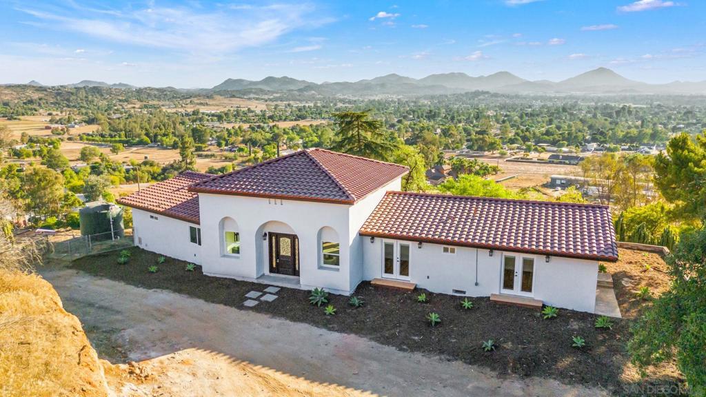 VIEWS, VIEWS, VIEWS! This spacious home is filled with natural light and showcases breathtaking panoramic views from every window. Welcome to 161 Steffy Rd, a beautifully remodeled 5-bedroom, 3-bath Spanish-style retreat that perfectly blends timeless charm with modern elegance. The open-concept layout features new fixtures throughout, sleek stainless steel appliances, and fully updated bathrooms. Step outside to an expansive deck, the perfect place to relax, entertain, and soak in the serene surroundings. This property also includes an oversized garage with RV parking and two long, private driveways offering plenty of space and seclusion. Sitting on 10.4 acres across two parcels, there's room to grow, with the potential to build on the second parcel. The home is equipped with both city and well water, plus multiple water tank reservoirs on-site. A rare opportunity to own a private hilltop estate with style, comfort, and unmatched views in every direction!