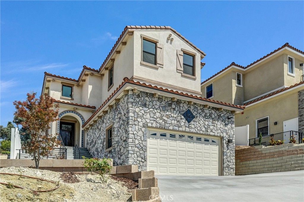 Photo of 681 Castlehill Drive, Walnut, CA 91789 (MLS # WS25232975)