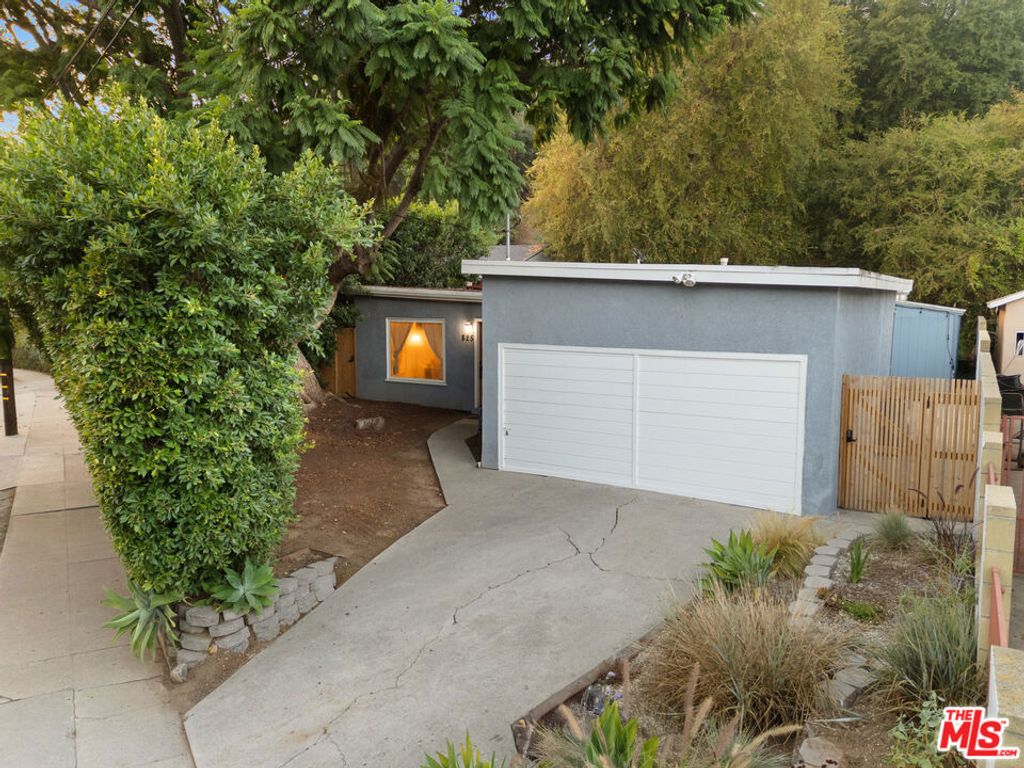 Photo of 825 N Avenue 67 Ave, Los Angeles, CA 90042 (MLS # 25615559)