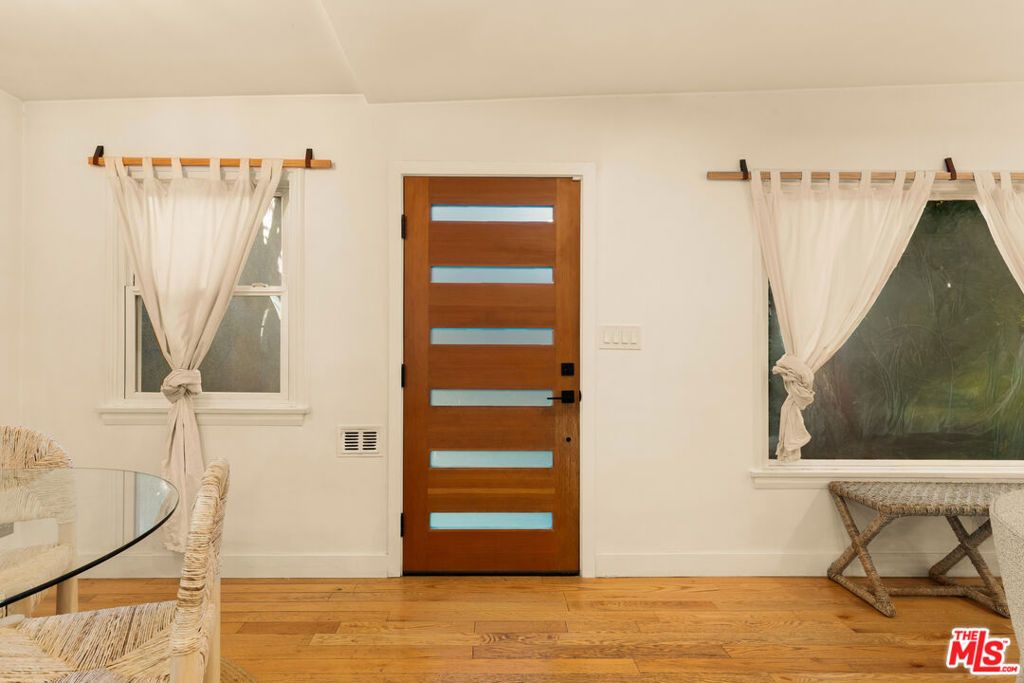 Photo of 825 N Avenue 67 Ave, Los Angeles, CA 90042 (MLS # 25615559)