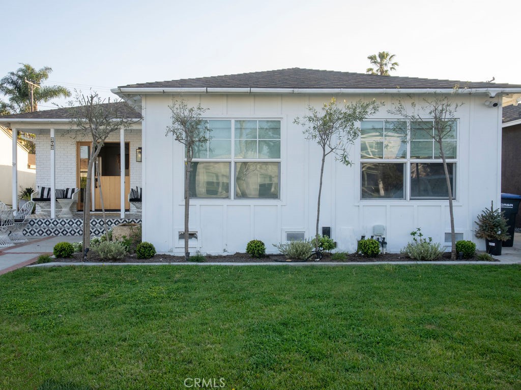 Nestled in the heart of Eastside Costa Mesa, this charming 4-bedroom, 2-bath beach bungalow blends timeless style with modern updates. Offering 1,650 square feet of beautifully renovated living space, the home features wide-plank White Oak hardwood floors, an inviting Dutch door entry, and a chef's kitchen equipped with a Viking range, Sub-Zero wine fridge, and Bosch dishwasher. Perfect for both relaxing and entertaining, the property includes a spacious indoor laundry room and an expansive backyard designed for outdoor living. Enjoy gatherings on the IPE wood deck, unwind in the Jacuzzi, or cook up something special with the built-in BBQ, outdoor fireplace, and pizza oven. Located on the highly desirable 300 block of Flower Street and within the award-winning Mariners Elementary School district, this home offers a rare opportunity to enjoy the best of Eastside Costa Mesa living.