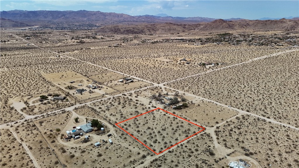 This 2.5-acre property in the highly sought-after Joshua Tree area offers the perfect opportunity to build your dream home or invest in a growing community. This property is just minutes from the Joshua Tree National Park visitor center, Copper Mountain College, Hi-Desert Medical Center/Emergency Room, and downtown Joshua Tree. You are also very close to neighboring Yucca Valley and 29 Palms. Joshua Tree is experiencing growth as people leave the city searching for a slower pace of life in a rural community. Utility access is nearby and all interested buyers are encouraged to confirm connections costs with the utility companies directly. Come drive by and see what this rural desert community has to offer! APN# 0605-191-18-0000 Coordinates: 34.172781 / -116.298097
This property does not have an address assigned. "760 Carmel St" is for listing purposes only.