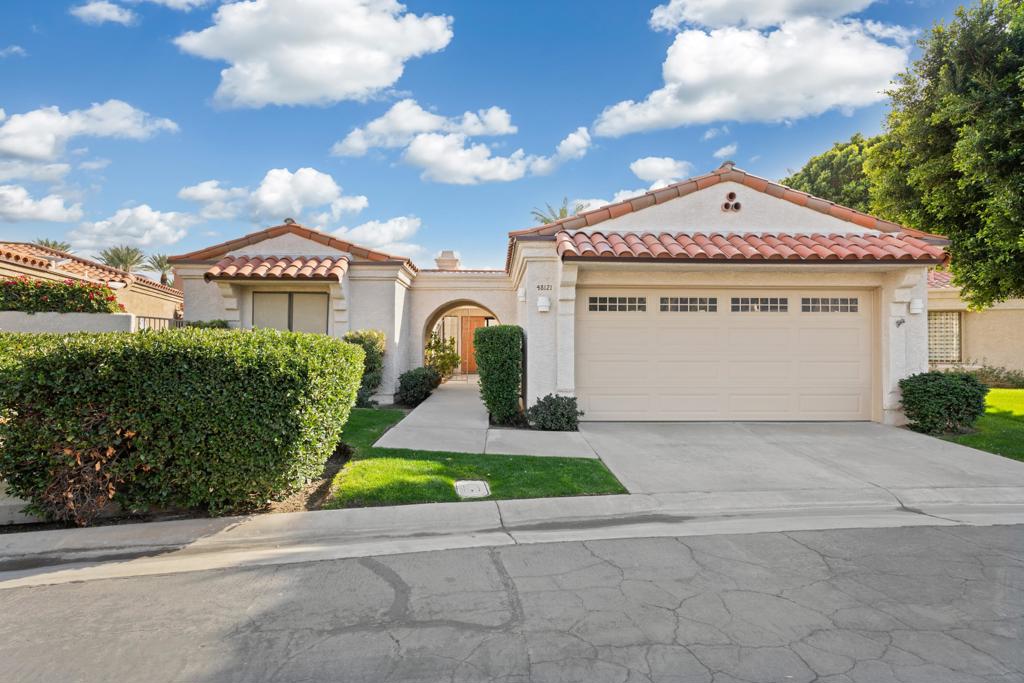 Located in the guard gated lake community of Laguna De La Paz.. This 3 bedroom and 3 bath home of almost 1900 sq,. ft. is on a large pie shaped lot. You enter thru a gated court yard into a large living room with a wet bar and fireplace. To your left you have the formal dining room. The kitchen has a eating area. The master has a sitting area. The master bath features a sunken tub and seperate shower that opens to an atrium. The other two bedrooms have their own bathroom and are located on the opposite side of the home. The living room, dining room and master all open to the wrap around patio with a fire pit and BBQ. Plenty of room for entertaining or just relaxing. The community has 11 pools and 12 spas, a lake with electric and paddle boats, tennis courts, pickleball, gym and club house. Located close to some of the Desert's best golf, tennis, concerts, casinos, dining and entertainment. Old Town La Quinta and the La Quinta Resort and Spa are just down the road. Great location for full time or seasonal living.