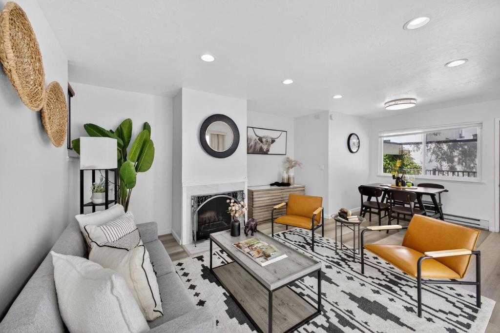 Welcome to 1919 Alameda De Las Pulgas #38, a beautifully updated, sun-filled townhome-style condo in the sought-after gated community of The Gardens in West San Mateo. This popular Atrium model features 2 bedrooms and 2 full bathrooms across a flexible open floor plan, including a spacious upstairs primary suite and a downstairs bedroom with private courtyard access. The living area offers a wood-burning fireplace and opens to a large, private internal patioideal for relaxing or entertaining. Enjoy a modern kitchen with granite counters, stainless steel appliances, and in-unit washer/dryer hookup. Other highlights include recessed lighting, LVP flooring, under-stair storage, and dual-pane windows. Community amenities include indoor & outdoor pools, spa, clubhouse, gym, on-site manager, and ample guest parking. HOA covers roof, exterior, landscaping, and more. Includes 2 parking spaces (1 covered, 1 open). Conveniently located near SFO, Caltrain, BART, HWYs 92/101/280, parks, Hillsdale Mall, and top-rated Aragon High School.