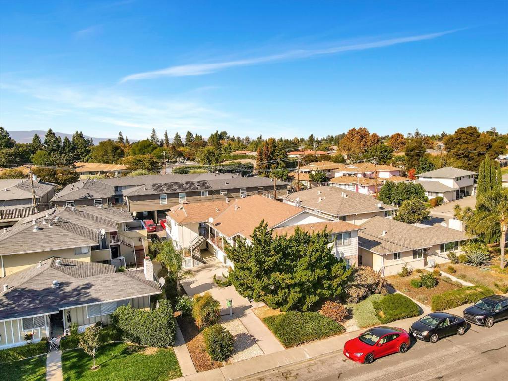 184 Roxbury Street in Santa Clara, CA presents a unique opportunity for investors looking to capitalize on one of Silicon Valley's most desirable cities. This charming six-unit multifamily community, built in 1960, offers 4,484 square feet of rentable space and is situated on a 6,600 square foot lot. The property consists of four spacious one-bedroom and two two-bedroom units, providing a variety of living options for tenants. With six designated carport parking spaces located at the rear of the property, this asset ensures convenience for both residents and investors alike.