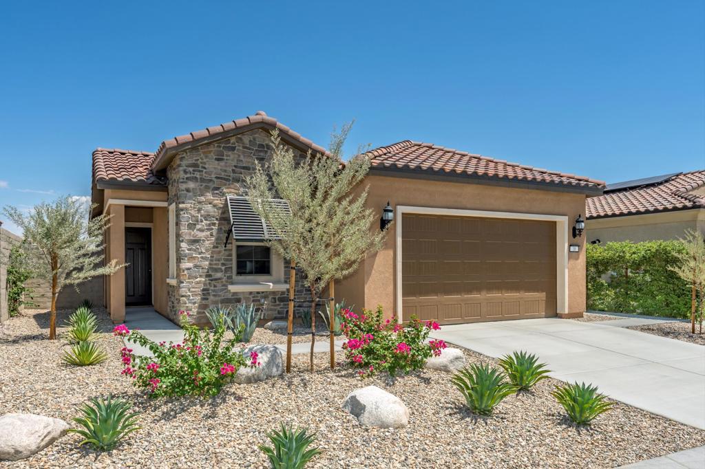 Welcome to 38 Zinfandel, a well-designed home in the desirable Del Webb Rancho Mirage 55+ community. This single-story residence offers two bedrooms, two bathrooms, and an office across 1,770 square feet of living space.The open floor plan creates a natural flow between the kitchen, dining, and living areas, ideal for both everyday living and entertaining. Large windows bring in natural light, while the layout offers flexibility to fit a variety of lifestyles.On its 5,627 square foot lot, the backyard provides a private setting with low-maintenance landscaping and space for outdoor dining or relaxation.As part of Del Webb Rancho Mirage, residents have access to resort-style amenities at the Outlook Clubhouse, including tennis, pickleball, bocce, a fitness center, putting greens and two swimming pools.38 Zinfandel combines modern comfort with an active community setting, offering a home that is both practical and inviting. Contact me for a private showing and to explore the home's features and upgrades.