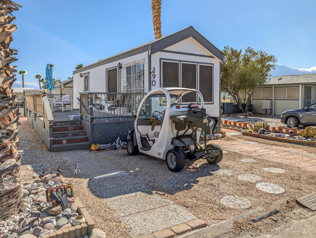Very nice and well-maintained! Super convenient location close to clubhouse and central to all activities. Peek-a-boo views of Mt. San Jacinto and local hills from the large sun/wind protected deck plus a lower-level patio. This gem is so efficient and bright with ~400 sq. ft., 1 bed, 1 bath, shed with a washer/dryer and driveway for 2 cars, this is the perfect getaway in the desert come see all this waiting for you and the golf cart ($5k) included with the house. Caliente Springs is a 55+ Premiere RV Resort with beautiful Park Model homes and amenities that include mineral fed hot springs pool and spas, laundry facilities, gym, and great community activities and involvement. Make new forever friends. Lot is not owned; space rent is ~$707. Easy lender financing (OAC).