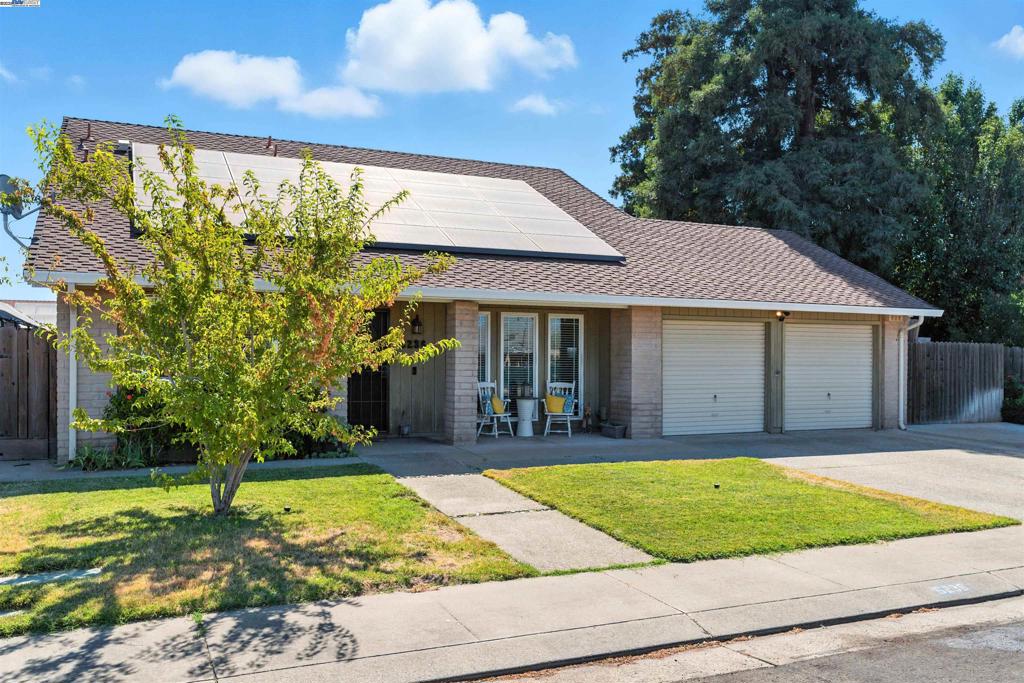 Welcome to 6236 Choctaw Court – Where Comfort, Charm, and Style Come Together. Step into this beautifully cared-for 4-bedroom, 2-bath 1752 sq ft ranch-style gem, perfectly nestled in a peaceful cul-de-sac. This home is designed for easy living and joyful entertaining—inside and out. You’ll love the warm and spacious sunken living room, the cozy dining area, and the thoughtfully updated kitchen featuring granite countertops, double ovens, and a gas cooktop that opens into the inviting family room—perfect for staying connected while cooking. A cheerful window over the kitchen sink offers a relaxing view of the serene side yard. With two bedrooms upstairs and two more downstairs, the layout offers flexible living options for families, guests, or a home office setup. Both bathrooms have been tastefully updated, and energy-efficient vinyl dual-pane windows let in plenty of natural light throughout. Step outside and fall in love with your very own park-like backyard—complete with a fenced, solar-heated Pebble Tec pool, ideal for summer days and weekend gatherings. Plus, enjoy the added benefit of leased solar for energy savings all year long. This home is more than a place to live—it’s a place to thrive. Come see it for yourself, and imagine the memories you'll make here.