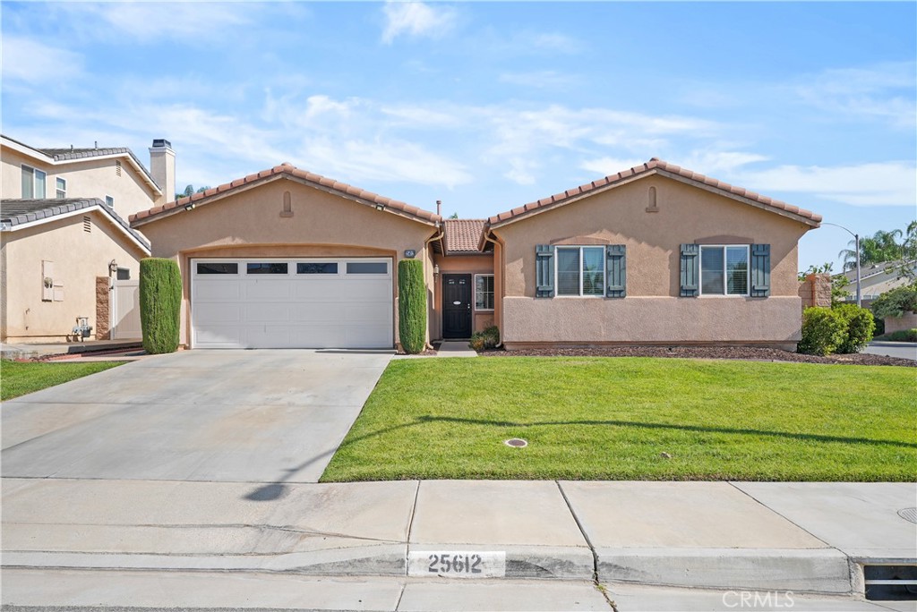 Welcome to your dream home in the desirable Menifee community located at 25612 Turfwood Street! This stunning single-story residence sits beautifully on a quiet corner lot at the entrance of a peaceful cul-de-sac, offering both privacy and convenience. The home showcases an open and airy floor plan with 1,886 square feet of thoughtfully designed living space.
Enter to discover 4 spacious bedrooms, 2 well-appointed bathrooms, and a versatile bonus room perfect for a home office, activity room, or hobby space. The heart of the home features a gourmet kitchen with a large granite-topped island with barn style sink, crisp white cabinetry, with under cabinet lighting and stainless steel appliances. The kitchen flows seamlessly into the expansive family room, complete with a cozy fireplace and dining area, creating an ideal space for family gatherings and entertaining guests. Home also features a Quiet Cool house fan.
The outdoor experience is truly exceptional, featuring a large patio area with artificial turf for low-maintenance, stained stamped concrete, drought-tolerant landscaping. An oversized Aluma-wood patio cover provides perfect shade for outdoor barbecues (with natural gas hookup) and relaxation. The crown jewel is the stunning pebble tech saltwater pool and spa, where family and friends can enjoy countless hours of recreation and relaxation.
Located in a welcoming neighborhood, this home offers easy access to local schools, shopping, dining, and recreational facilities. The community provides an excellent blend of suburban tranquility with modern conveniences nearby. The well-maintained streets and welcoming atmosphere make this an ideal location for residents seeking both comfort and connection.
This turnkey property radiates pride of ownership throughout, from the well-maintained interior to the beautifully landscaped outdoor spaces. The single-story layout provides convenient living, while the corner lot position provides additional privacy and space. Ready for your personal touches, this exceptional home won't last long in today's market. **professional photos coming soon**