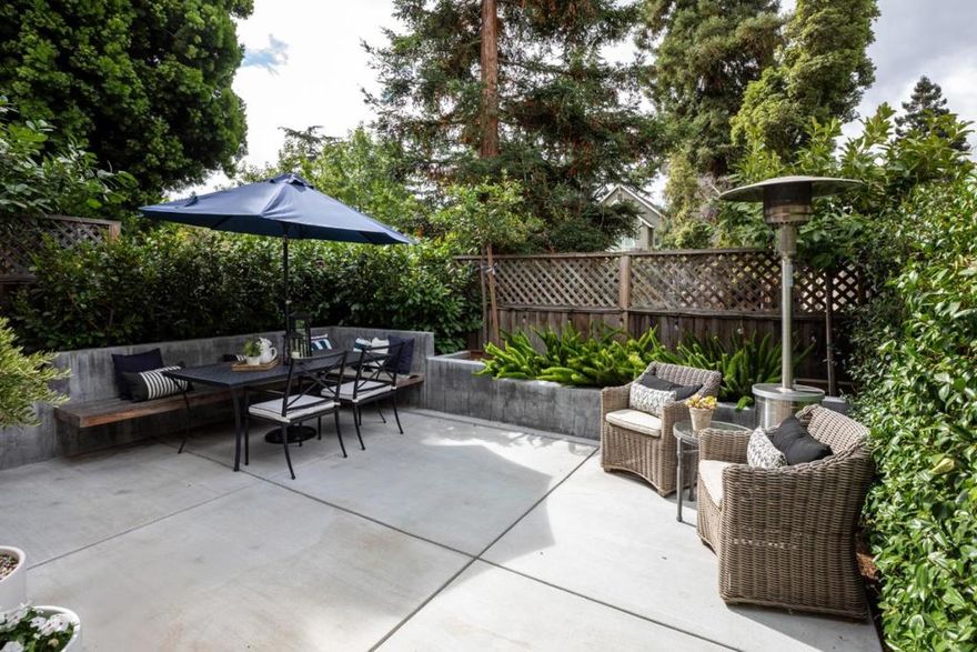 Private Driveway Welcomes You into One of the Finest Townhome Communities in MV! Don't miss this opportunity to own in the heart of Downtown Mountain View! This former model 3 bedroom 2.5 bathroom stunning unit has been beautifully updated with a remodeled kitchen and bathrooms, new tile flooring, all-new landscaping, and the convenience of upstairs laundry. The inviting layout features an eat-in kitchen with views of the beautiful common grounds, a spacious living room with a charming fireplace and direct access to a private backyard retreat. Upstairs, the primary suite boasts soaring cathedral ceilings, a walk-in closet plus an additional double-wide closet. Vaulted ceilings throughout the upper level enhance the natural light and open feel. Additional highlights include a detached one-car garage, an assigned open parking space, and a warm community of neighbors that make this enclave one of my favorite townhome developments in MV! Located just three short blocks from vibrant Castro St, 1.5 blocks from the highly acclaimed Farmers Market and Caltrain, and a pleasant stroll to schools, parks, and Stevens Creek Trail! Easy access to major tech campuses and commuter routes!