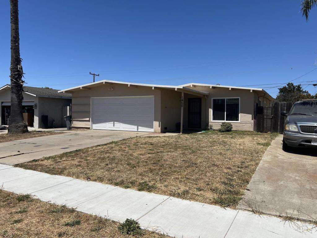 Welcome to 1455 Marin Ave in North Salinas. This well-maintained home offers 3 bedrooms, 1.5 baths, and an attached 2-car garage with an additional parking pad featuring RV gate access to the backyard. Inside, enjoy open beamed ceilings, a remodeled kitchen with stainless steel appliances and upgraded cabinets, plus plenty of natural light throughout. Step outside to a spacious backyard ready for your personal touch ideal for entertaining or gardening. Conveniently located near schools, shopping, and commuter routes. Dont miss this versatile property with ample parking and potential.