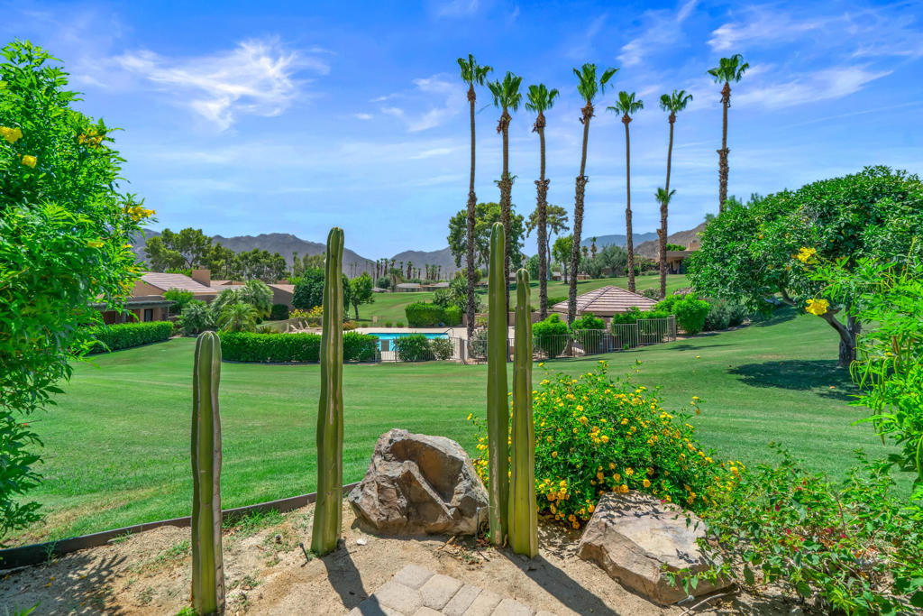 Welcome to Ironwood Country Club, a private golf community. This 3-bedroom, 3-bathroom, 1,864 SF condominium offers an abundance of indoor and outdoor living space. The Primary Bedroom features a vaulted ceiling with ceiling fan, sliding doors off to a private patio and an en suite bathroom. The Second Bedroom features its own private entrance, skylight and en suite bathroom. The Third Bedroom/Den/Office has skylight and access to the third bathroom. The main living area with vaulted ceiling and clerestory windows is very spacious, has a wall of windows from the living room to the kitchen offering panoramic views of the Santa Rosa Mountain Range, green belt and pool. Several sun tubes are throughout the property to add additional natural light. The covered patio, complete with a motorized retractable awning, offers the perfect space for outdoor living. Enjoy your morning coffee or evening gatherings while taking in the stunning mountain views. HOA amenities include Guard Gate access for enhanced security and community pool and spa. Golf membership is not a requirement to enjoy the lifestyle offered by this beautiful community. This is a Conservator Sale and requires Court Approval.