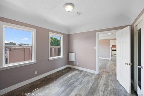 Photo of 845 W 75th Street #847 1/2, Los Angeles, CA 90044 (MLS # DW25236901)