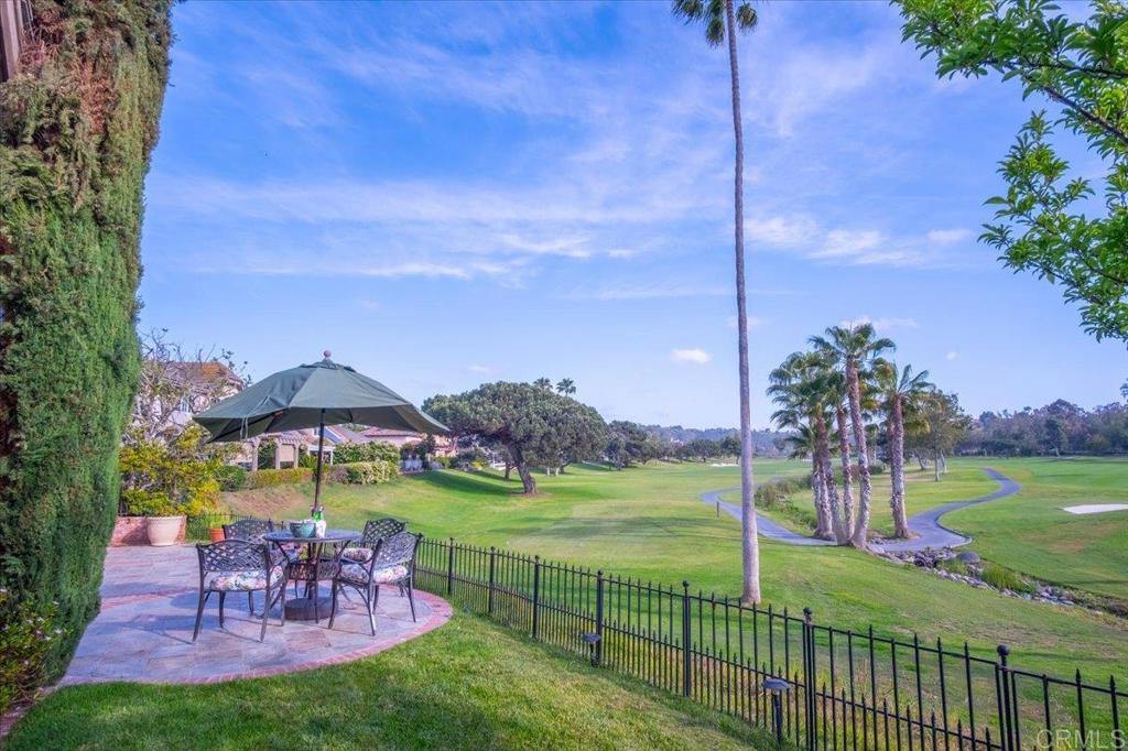 Significant price adjustment on this Exceptional property with panoramic golf course views! This home offers far more than the enchanting story book exterior... it exudes charm plus traditional elegance. Solid wood doors, wood and stone tile floors throughout, solid wood beamed ceilings, wood windows, custom solid wood cabinetry and each bedroom is dual zoned. The many additional features include a water softening system throughout, extra attic space, epoxy floor 3 car garage, 3 impressive fireplaces and French doors that frame the amazing garden and golf course views! The generous floor plan includes 4 ensuite bedrooms, a library plus an office/sitting room. This home was thoughtfully constructed with integrity, strength and a keen eye for detail. It is truly a one of a kind property that could easily justify $1,200 per sq. ft. but is being offered at $728 per sq ft! An absolute Gem!