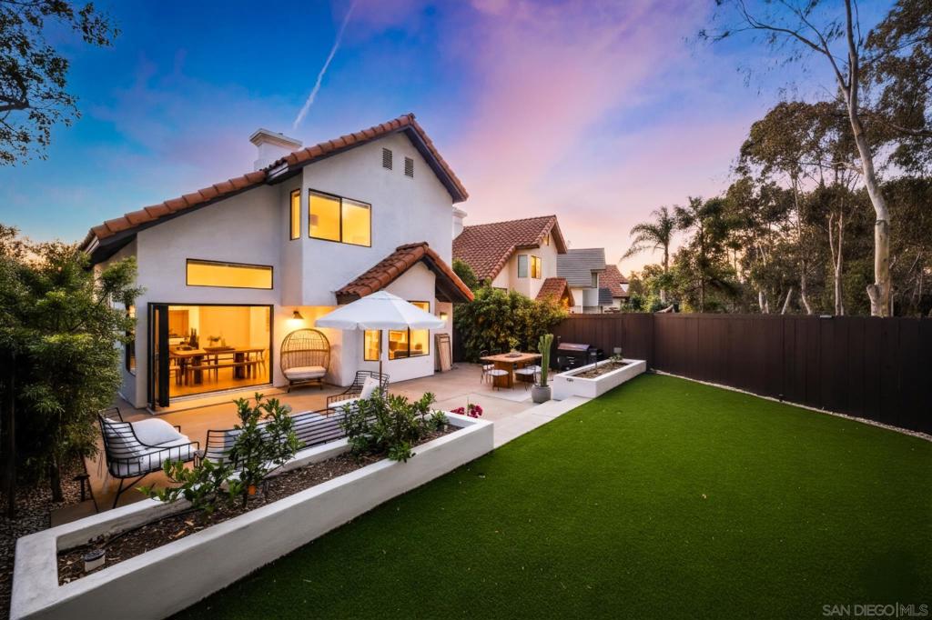 Welcome to your Carlsbad retreat! This beautifully updated 3-bedroom, 3-bathroom, two-story home blends modern upgrades with the relaxed coastal lifestyle Carlsbad is known for. The open-concept kitchen is a showpiece with quartz countertops, upgraded cabinetry, and a seamless flow into the dining and living areas. A California door opens to the newly redesigned backyard, creating a true indoor-outdoor living experience. Fresh hardscape, built-in planters, and low-maintenance artificial grass make it the perfect space for entertaining or unwinding after a long day. Inside, vinyl wood flooring runs throughout, while the freshly painted exterior and epoxy-finished garage showcase thoughtful updates. Situated in a desirable Carlsbad community, residents enjoy access to a sparkling pool and tennis courts—all just minutes from beaches, shopping, dining, and top-rated schools. Experience the best of coastal living in this move-in ready home.