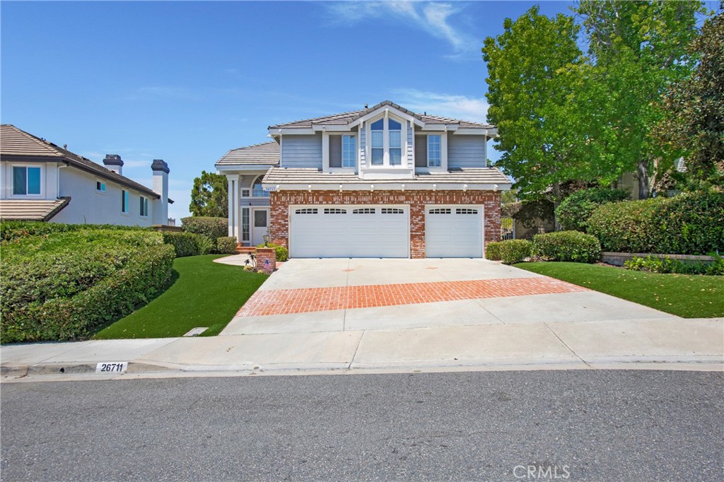 Beautiful view home with sparkling spa! Make this property your home for wonderful summer fun inside and out! Amenities include main floor full bath and bedroom/office. Large formal living and dining area make for a grand entrance at the double door entry. A beautiful grand piano (which could remain or be removed) can automatically serenade your guests or be used by your favorite pianist! A large chef's kitchen has tons of counter space and a prep sink so everyone can assist the chef. This opens to the family room that has french doors leading to the backyard that features an in ground spa & view that go on forever. The amazing view can also be enjoyed on the primary suite balcony, accessed by french door. Also in the primary suite is a large retreat area with french doors opening to a Juliet balcony overlooking the formal living area, a dual sided fireplace and a wall mounted TV for your viewing pleasure. The primary bath has a large oval tub and separate shower and a large walk in closet. The roomy secondary bedrooms share a full size jack & jill bath. Neutral paint, flooring & carpet throughout. Separate laundry room includes washer & dryer. 3 car garage with plenty of storage, too. All this in an exclusive neighborhood near Nellie Gail Ranch. Easy access to freeways & toll roads, conveniently close to shopping and restaurants.
