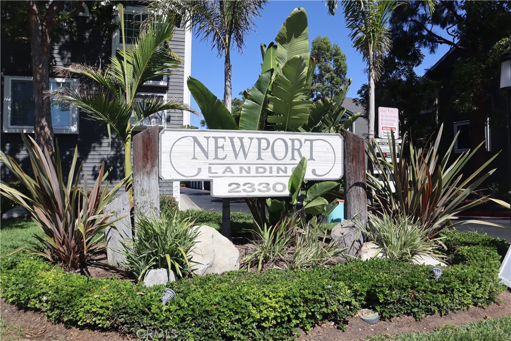 Newport Landing! Experience comfort and convenience in this charming Cape Cod-style community with lush, manicured landscaping throughout. This beautifully designed 2-bedroom, 2-bathroom home offers a well-thought-out floorplan perfect for privacy and easy living. Each spacious bedroom features its own bathroom, ideal for guests or roommates. Upon entry, you're greeted with an open-concept layout that provides clear sightlines from the dining room, kitchen and living room leading to a private deck/patio with serene views. The updated kitchen includes quartz countertops and a garden window that brings in natural light. The primary suite boasts two generous closets and a cozy alcove – perfect for a reading nook or quiet retreat overlooking the pool. Enjoy direct views of one of the two sparkling community pools from your bedroom or private deck, creating a resort-like atmosphere. Additional highlights include an in-unit laundry closet conveniently located between the bedrooms and two separate garages for parking or extra storage. Newport Landing’s prime location puts you just minutes from beautiful beaches, the Orange County Fairgrounds, Vanguard University, Orange Coast College, local dining, shopping, and easy access to major OC freeways.