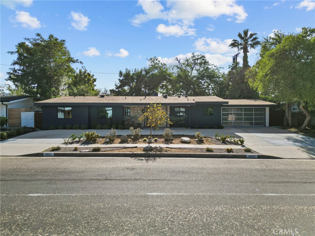 A True Entertainer’s Dream! Welcome to this stunningly reimagined 3-bedroom, 3-bath Charles Du Bois masterpiece, nestled on an expansive 10,000+ sq ft lot. This rare find combines the architectural pedigree of a renowned mid-century designer with the modern upgrades today’s buyers crave.
Step inside to discover open, light-filled spaces with new vinyl flooring, recessed lighting, and dramatic bifold patio doors in both the living and family rooms—perfectly blurring the line between indoors and out. The sleek, updated kitchen is a showstopper, ideal for entertaining or quiet nights at home. All bathrooms have been tastefully remodeled, including the spa-like primary ensuite featuring a freestanding tub and separate glass-enclosed shower.
Your private backyard oasis awaits! Enjoy a sparkling pool, lush mature greenery, multiple lounging areas, and brand-new drainage for peace of mind. Enjoy peace of mind with upgrades including newer HVAC system, stainless steel appliances, upgraded drainage in the backyard, turf, and drought-tolerant landscape.—move-in ready and designed for California living.
Located just minutes from The Village, The Commons, premier Woodland Hills shopping, and trendy restaurants, this home offers the perfect blend of style, comfort, and convenience. Some Photos include Virtual Staging.