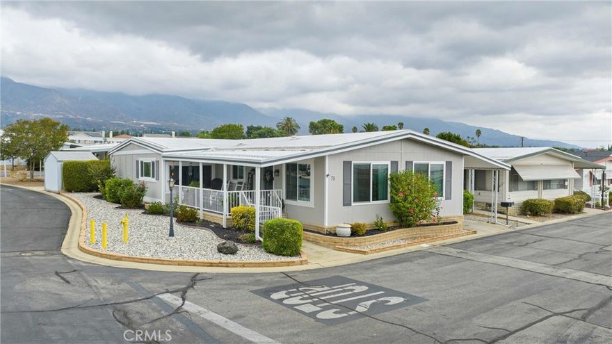 Location, Location, Location.  Welcome to Ramona Villa Estates, A Highly Desired 55+ Community.  Pride of ownership shines through this wonderful  two-bedroom, two-bath manufactured home.  This well maintained home  offeris approximately 1,440 sq. ft of living space on a desirable corner lot with stunning mountain views. From the moment you arrive, you'll notice the  thoughtful updates that make this home move-in ready.  Extensive improvements provide lasting value and peace of mind, including:   professional leveling with 36 new foundation support piers, energy efficient dual pane windows, a new reinforced front porch with outdoor carpeting and updated entry stairs at front and rear of home. Exterior paint and refreshed landscaping within the last 3 years. 



Step inside to high ceilings and an inviting open floor plan, featuring a spacious formal living and dining rooms with built in cabinetry and laminate flooring.  The kitchen opens up to a spacious living area that features built-in book shelves with two desk/work areas.  The kitchen offers corian countertops and an electric cooktop stove, blending style with functionality. 



The primary suite includes two walk-in closets, currently being used as a quilting/craft room.  The adjacent primary bathroom has a large soaking tub and separate shower.  A well appointed guest bedroom is located near a full bath with shower, providing comfort for visitors.  Additional highlights include indoor laundry room with closet that can be used as an additional pantry and/or storage space.   Note: Square footage is estimated at 1,440 sq. ft.  A previous owner completed an addition. Buyer and Buyer's Agent to verify all information and conduct due diligence. This home is a rare find in one of the area's most desirable senior communities.  Schedule your showing today.  Please note,  park approval is required.