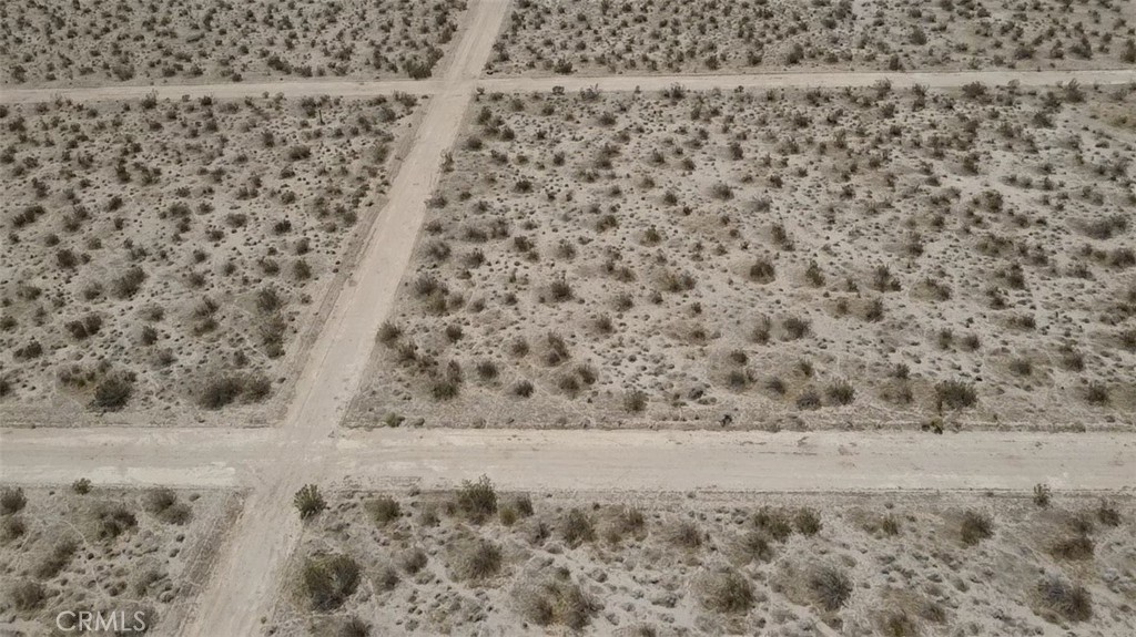 Build your vision on this spacious .35-acre lot in Kern County, offering flat terrain and wide-open views—perfect for a custom home, manufactured home, or long-term investment. Enjoy peaceful surroundings with easy access to local highways and nearby Mojave. No utilities on site; buyer to verify zoning, usage, and availability of services.