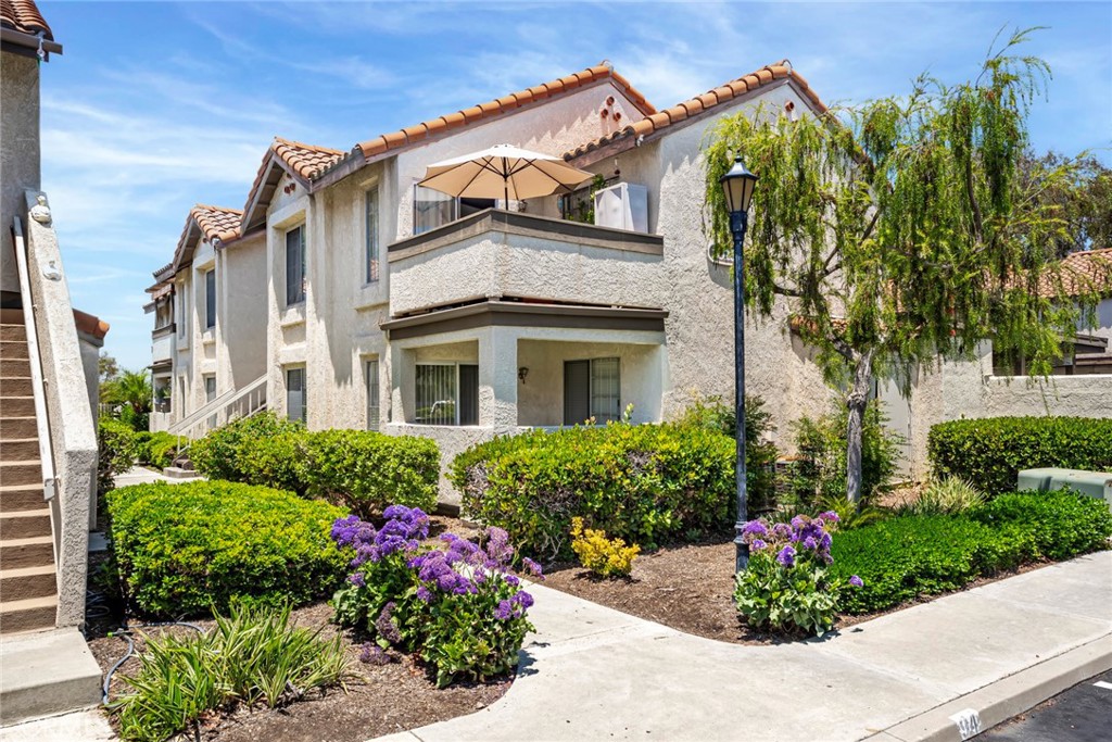 Experience Mission Viejo Living! Welcome to this desirable single-level condominium nestled in the heart of Mission Viejo in the sought-after community of Las Palmas. Located on the main floor with no steps and features 700 square feet of thoughtfully designed living space including two-bedrooms that each have an en-suite bathroom to provide optimal privacy and convenience for both residents or guests, a fully appointed kitchen, convenient inside laundry, and a slider that opens to your tranquil covered patio to BBQ or just enjoy the outdoors. Additional highlights include two assigned parking spaces (one covered) and extra storage for all your essentials. Property has been repiped. Enjoy resort-style amenities with access to two community pools and a hot tub, perfect for unwinding and connecting with neighbors. Plus, HOA 2 includes coveted Mission Viejo Lake membership, granting you access to private beaches, boating, fishing, kayaking, lakeside concerts, a snack bar, and scenic walking and biking trails. Situated in the highly acclaimed Saddleback Valley Unified School District, this home is also a commuter's dream—just minutes from the 5 and 405 freeways and close to the Irvine Spectrum and The Shops at Mission Viejo.
