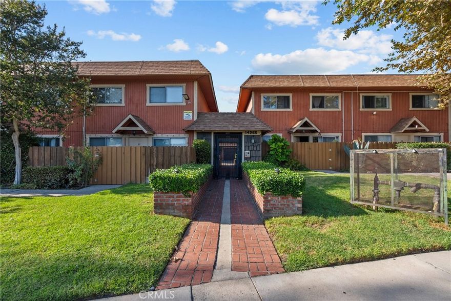 Discover this beautifully updated 3-bedroom, 2.5-bathroom townhome located in a secure, gated community in Panorama City. Offering comfort, style, and modern convenience, this move-in ready home is perfect for families, first-time buyers, or investors seeking a low-maintenance property in the San Fernando Valley.  The inviting living room features a gas fireplace, ceramic tile floors, and abundant natural light that flows seamlessly into the dining area and kitchen. The kitchen is fully updated with new stainless steel appliances, marble countertops, and ample cabinet space—perfect for everyday cooking and entertaining. Sliding glass doors lead to a large front patio with a mature orange tree, creating a private outdoor retreat with enough space for a bistro set. A convenient half bathroom downstairs makes entertaining easy.  Upstairs, enjoy newer laminate hardwood floors throughout, plus ceiling fans in every room for year-round comfort. The spacious primary suite includes its own private bathroom, while two additional bedrooms share a full bath. Fresh interior paint gives the entire home a modern and inviting feel.  Additional highlights include central air and central heat, a front entrance security iron door, and a direct-access 2-car garage with new garage doors, upgraded motors with backup batteries, and washer/dryer hookups for maximum convenience.  All of this is located in a well-maintained gated community with low monthly HOA fees, offering both peace of mind and affordability. With easy access to the 5, 405, and 118 freeways, plus close proximity to schools, parks, shopping, and dining, this property is a rare find in today’s market.  Don’t miss your chance to own this updated Panorama City townhome—schedule your private showing today!