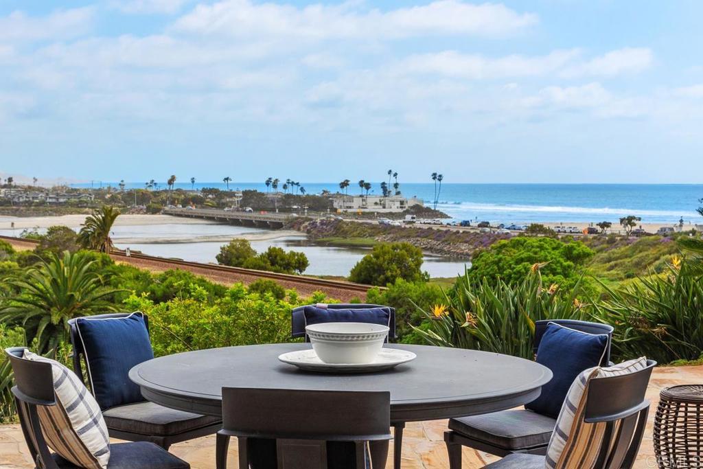 Available Short Term. Also available for lease for one year furnished or unfurnished or short term furnished (6 month minimum). Beautiful single family home with iconic views of the ocean and the Del Mar Race Track. A quiet, peaceful, well built home with private pool and spa and high end finishes. Gated with additional prime parking. Located around the corner from Del Mar Beach, Dog Beach and many restaurants. Ocean views from every room. 4th bedroom can be converted to office if desired. Call listing agent for Seasonal Rates.