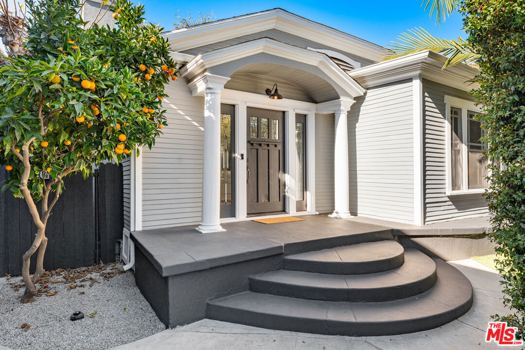 West Hollywood Gem! Experience unparalleled Craftsman architecture and modern interior design concepts on this tranquil 2-home + 1 ADU private compound located in the heart of legendary West Hollywood. Step inside the reimagined main house to find an array of desirable features including beautiful double-hung windows, handsome wood flooring, and several handcrafted built-ins and cubbies throughout. Relax in the living room with fireplace, or entertain guests in the chef's kitchen with marble countertops, custom wood cabinetry, antique stove, farmhouse sink, top-tier stainless steel appliances, and Dutch door leading to the outdoor patio. 2 generous bedrooms offer space for family, while an additional ADU with full bathroom provides ample room for studio, gym, office, guests, or additional rental income. Outfitted with smart home technology including a 50 amp EV charging station, Lutron Caseta WiFi switches, Ring security lights, and phone-controlled security cameras, this designer home offers the ideal combination of modern functionality and timeless craftsmanship. Outside on the gated grounds you'll find a private oasis with tall hedges, orange trees, avocado tree, large backyard for future pool, and a lush lawn ideal for sunset refreshments or hosting guests. A detached, private, completely updated 1/1 Craftsman home is perfect for additional passive rental income , and features lush wood flooring, top-tier stainless steel appliances, spacious bedroom, elegant bath, and private outdoor patio. Looking for a lucrative passive income opportunity? Live in the main house and lease the ADU and/or detached 1/1 Craftsman home for extra monthly revenue. Situated on a large 4,997 sq. ft. lot and just minutes to fine dining, upscale cafes, nightlife, recreation, upmarket retail, and award-winning schools, this meticulously maintained architectural gem offers a once-in-a-lifetime opportunity to generate lucrative passive income or build your own multi-structural paradise in one of L.A.'s most iconic neighborhoods.