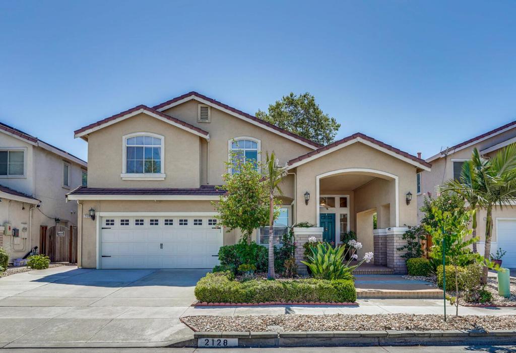 Smart, stylish, and sophisticated, this former model home is a true gem in the heart of Silicon Valley. Featuring five spacious bedrooms and three full baths, the flexible layout is ideal for multi-generational living, remote work, or entertaining. Step into the formal entryway and be welcomed by a bright living room with soaring ceilings and abundant natural light. Brand new flooring throughout adds a fresh, modern touch. The chef's kitchen boasts granite island counters and flows seamlessly into open living spaces. Upstairs includes three bedrooms and two baths, with a luxurious master retreat offering a sitting area, jetted tub, rain shower, and walk-in closet. For added convenience, the laundry room is located upstairs near the bedrooms. Downstairs provides two additional bedrooms and a full bath, perfect for guests, in-laws or added privacy. The formal dining room with crystal chandelier and separate family room with cozy fireplace add elegance and warmth. Smart home audio, keyless locks, central air, and meticulous upkeep reflect true pride of ownership. The paved backyard offers low-maintenance landscaping and a perfect space for outdoor entertaining. Located near Berryessa BART, shopping, cafes, parks, tech hub, this home offers both convenience and comfort. NEW LISTING