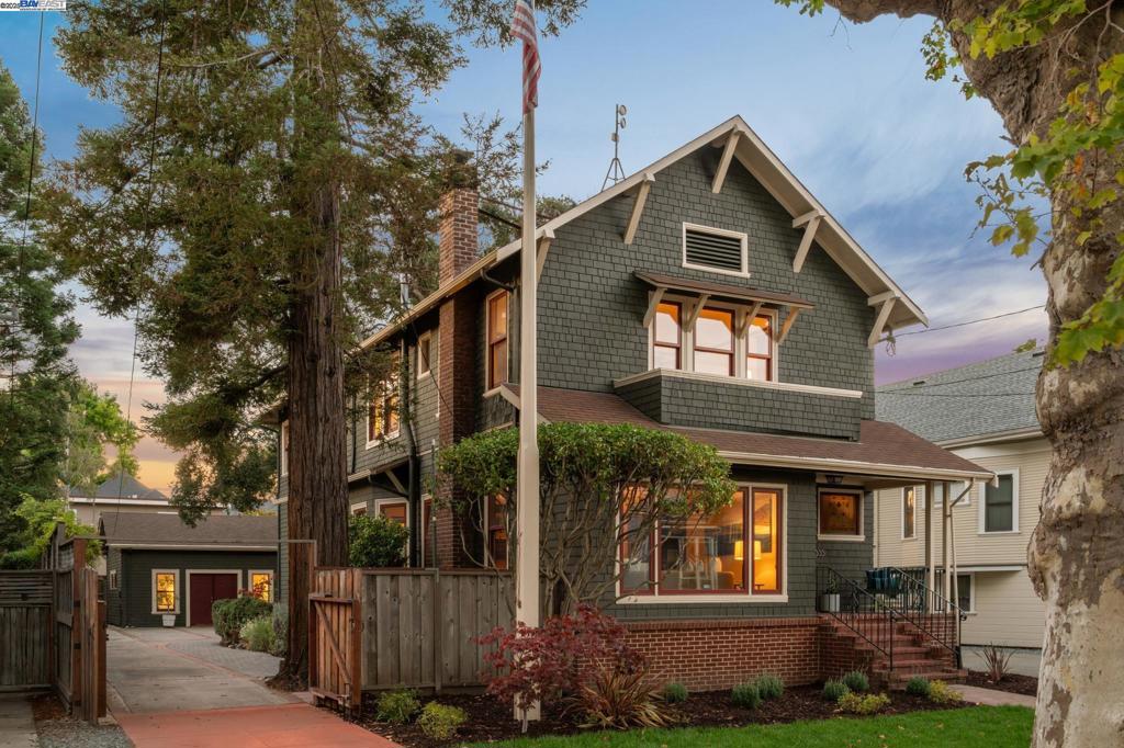 Built in 1910, this exceptional Brown Shingle Craftsman offers beautifully preserved vintage architectural details in an unusually spacious three-story home. Located just blocks to parks, top schools, Encinal Market & downtown Park St, a desirable location is just minutes to the beach & the South Shore Center's many amenities. The property offers a grand entrance hall, 3+ bedrooms, 2 full & 2 half bathrooms, formal living & dining rooms, an open kitchen + family room, & a large finished basement w. a media/family room & separate home office. Details include elegant Craftsman wainscoting, window trim & doors, a boxed beam ceiling, fireplace, hardwood floors, high coved ceilings, picture rails & pocket doors. The rooms are all generously sized, & the primary bedroom has a private ensuite balcony & walk-in closet. A finished detached garage at the rear of the property includes a home office, half bath + work shop/1-car garage, ideal for a potential ADU conversion (448 SF, measured), or convert to a 3 car garage. Plenty of secure off-street parking + an EV charger, 2 zone HVAC+AC, & dual pane windows. Beautifully maintained & cherished for 115 years, this gracious home offers an exceptional Alameda home ownership opportunity.
