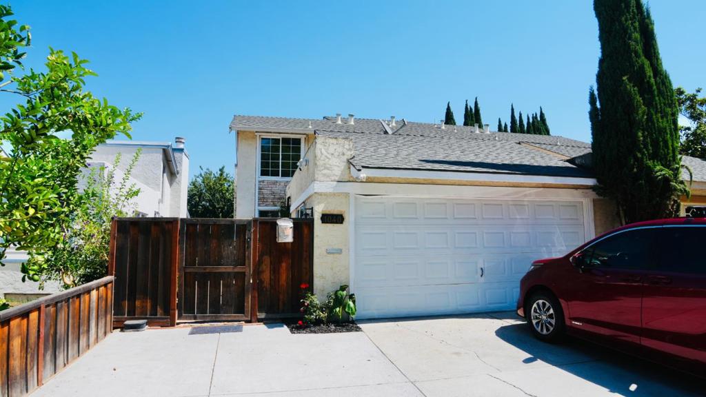 Welcome to this charming 4-bedroom, 3-bathroom home located in the vibrant city of San Jose. Boasting 1,608 square feet of living space, the property offers a comfortable and inviting atmosphere. The kitchen is spacious, providing ample room for cooking and dining, and is complemented by a designated dining area perfect for family gatherings. The home features central AC and central forced air heating, ensuring year-round comfort. Enjoy cozy evenings by the fireplace in the living area, adding warmth and charm. Flooring throughout the home is thoughtfully selected for both style and durability. Additionally, the convenience of a private laundry area adds everyday ease to your routine. Situated on a minimum lot size of 3,720 square feet, this home offers outdoor space for leisure and activities. The property is located within the boundaries of the San Jose Unified School District, catering to families seeking educational options.