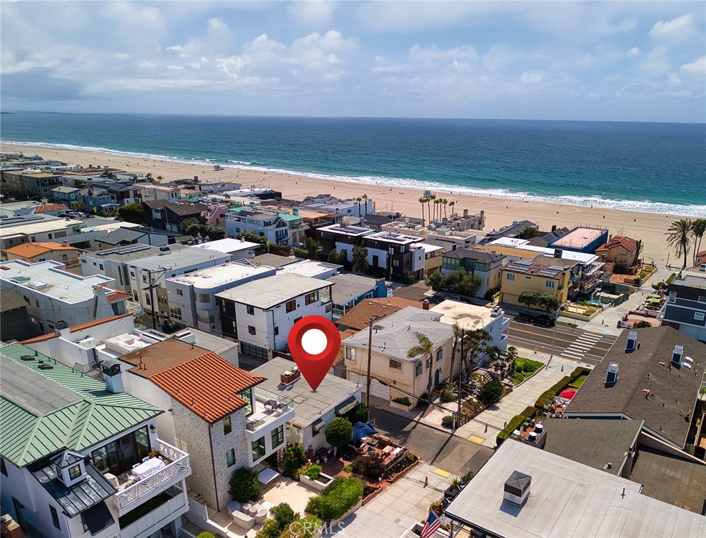 A rare opportunity on one of South Manhattan Beach’s most coveted walkstreet corners. This full 30' x 90' (approx.) lot currently holds two 2-bedroom 2-bath units, making it ideal for either immediate redevelopment or a “buy now, build later” strategy.
The corner orientation gives future builders a distinct advantage: an additional 2 feet of width due to reduced side setbacks, plus the ability to bring garages off Bayview—avoiding tandem parking for a third spot. From its southeast Bayview vantage point, the property captures sweeping ocean views to the northwest and west that are elite and unique to 216 and 217 addresses.
Each unit has it’s own address. 216 6th Street is 1500 sq ft (BTV) with 2 bedrooms/2 bathrooms. The kitchen and baths have been renovated and air conditioning has been added. There are two fireplaces, a two car garage, laundry room and private patio. 217 5th Place is 1100 sq ft (BTV) with 2 bedrooms/2 bathrooms, laundry room, a one car garage with an additional designated parking spot, and private patio.
Lifestyle doesn’t get better: just a block and a half to the sand, three short blocks to downtown dining and shops, and a quick stroll to award-winning Robinson Elementary.
South Manhattan Beach walkstreet opportunities like this are exceptionally rare—seize the chance to create your coastal legacy.