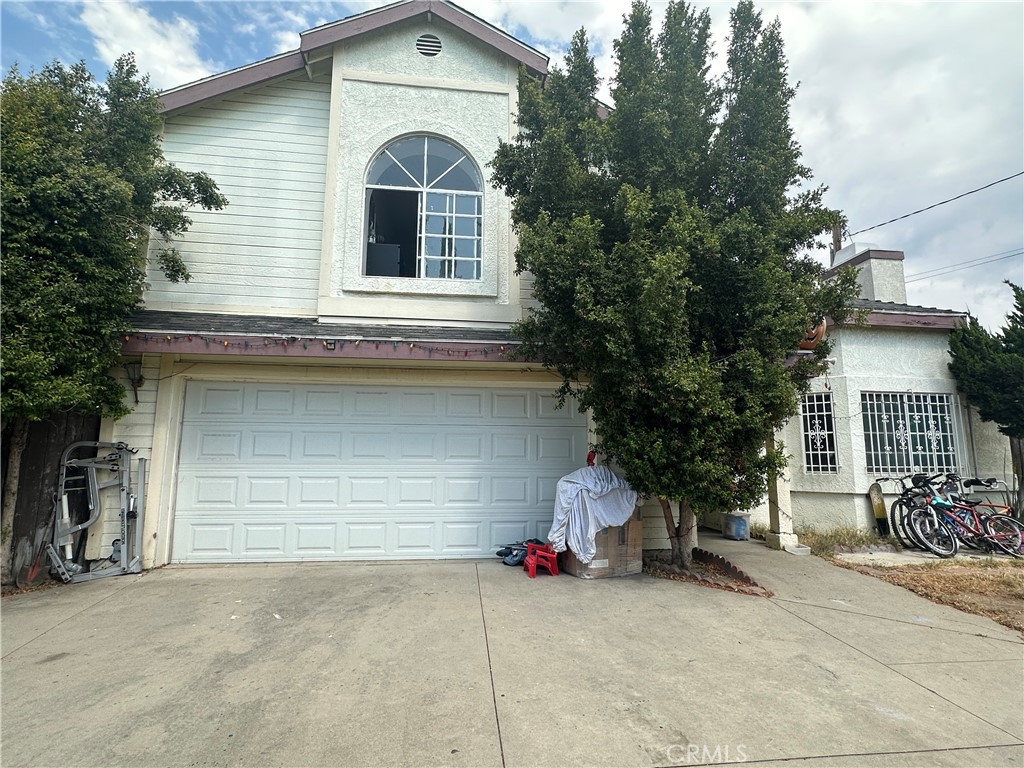 MOTIVATED SELLER! This home features 3 bedrooms plus a den, with 1 bedroom and 1 bathroom conveniently located downstairs. Enter into a warm and inviting living room with a fireplace, leading to a cozy dining area and kitchen. From there, step out into a spacious patio and a large backyard filled with various fruit trees, including lemon, jubilee, grapefruit, longan, and more, all situated on a 8,094 sq ft lot. Upstairs, you will find the master bedroom with a walk-in closet, along with 2 additional bedrooms and 1 bathroom. A solar panels were installed 2015, offering energy efficient and cost-effective usage. Conveniently located with easy access to the 605 and 10 freeways.