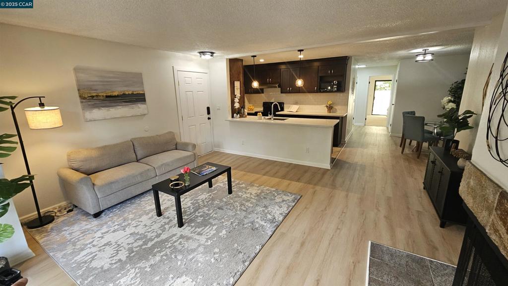 HUGE PRICE DROP!!!!! A charming lower level condo that offers 2-bedrooms, 1-bath with a spacious layout, ideal for first-time buyers, downsizers, or investors. Enjoy not 1 but 2 patios, open kitchen/living room great for entertaining, spacious bedrooms and in unit laundry. Conveniently located near shopping, dining, schools, and easy freeway access for commuters. Don’t miss this affordable opportunity to own in well established neighborhood! HUGE PRICE DROP!