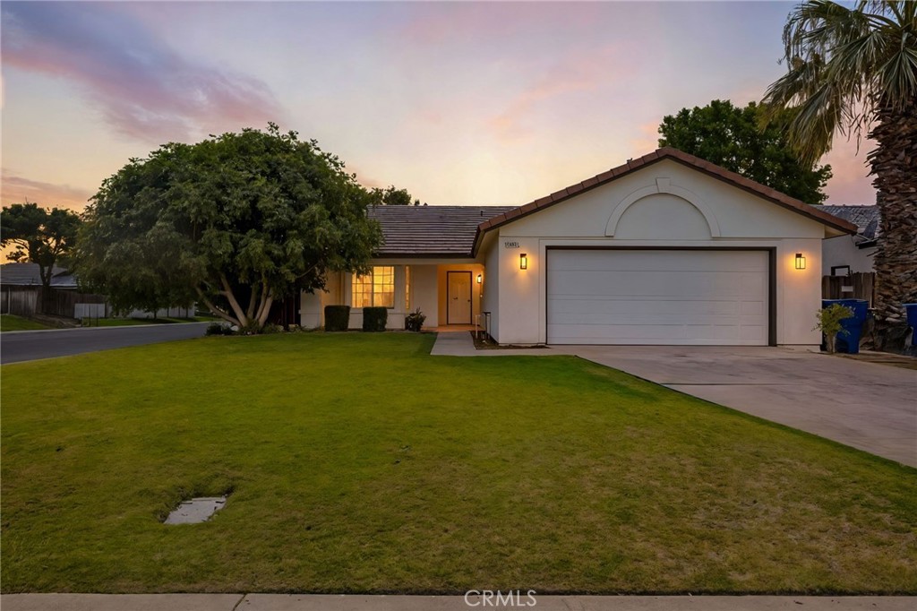 Fall in love with this 3 bed, 2 bath stunner, freshly updated from top to bottom. Enjoy brand new flooring, baseboards, cabinets, granite countertops, lighting, and fresh paint inside & out. Two new sliding glass doors flood the home with light, while the finished garage adds extra space for a gym, workshop, or hobbies. All on a spacious corner lot with great curb appeal — move-in ready and waiting for you!