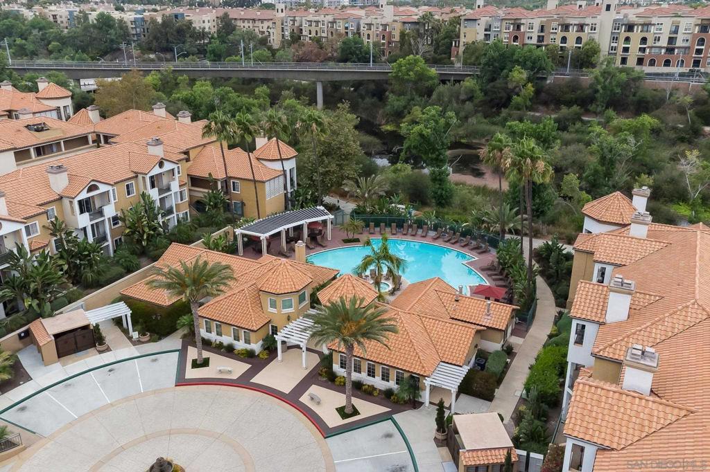 BEAUTIFUL 2 BED/2 BATH LOCATED IN HIGHLY DESIRABLE RIVER COLONY! Located on the banks of the San Diego River, Prime Mission Valley location within walking distance to shopping, dining and trolley!! Kitchen has stainless steel appliances, a fireplace, a private balcony off the Livingroom and Spacious bedrooms with abundant closet space. Hard surface flooring throughout. 2 PARKING SPOTS (conveniently located close to elevator) Community features resort style living with gorgeous pool and gym. A great value and a true must see! Complex Features: ,,,, Sewer: Public Sewer Topography: LL