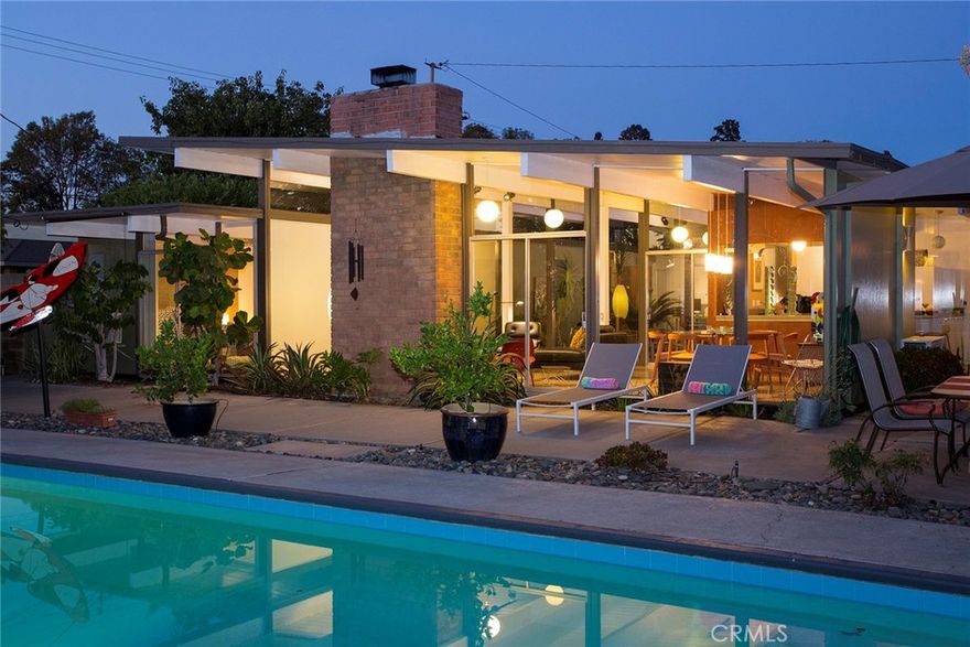 WARNING: This house may cause uncontrollable swooning, spontaneous dinner party planning, and an irresistible urge to quit your job and become a full-time poolside philosopher.

We've leased more Eichler Homes than anyone, but this Fairhaven Eichler? It's the one that made us want to ghost our own landlords. Seriously, if you could marry architecture, this roofline would already have our last name (and a very expensive ring).

What makes this place criminally cool:



**That Philippine mahogany though – Original wood so gorgeous it practically has its own Instagram account

**Rooms with personality disorders – Kitchen feels like a cozy coffee date, living room thinks it's hosting the Oscars

**The office – Modest square footage, maximum "I'm basically a CEO now" vibes thanks to those sky-high ceilings

**Natural light so good it puts ring lights to shame (your Zoom calls will thank you)

**Ductless AC throughout because sweating is so last century

P**aid-for solar – Mother Earth approves, your wallet rejoices

**EV-ready garage for when you inevitably buy that Tesla to match the house

**Corner lot = more space for your future garden parties and minimal awkward neighbor encounters

Pool situation that screams "cancel all your weekend plans, we're floating"



This isn't just a house – it's a lifestyle upgrade, a conversation starter, and quite possibly the reason you'll never want to leave home again. 



Side effects may include: increased happiness, spontaneous entertaining, and friends who suddenly want to visit "for no reason."