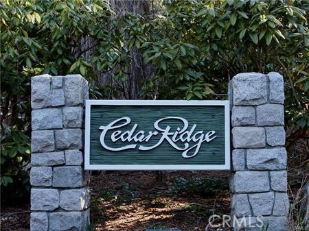 Introducing a rare opportunity to build your custom mountain retreat in the exclusive gated community of Cedar Ridge in Lake Arrowhead. Spanning over 35,000 square feet, this expansive parcel is tucked along a private cul-de-sac and offers the perfect canvas for your architectural vision. With Lake Rights included and underground utilities available, this parcel combines natural beauty with modern convenience. The community features wide paved roads, underground utilities, and a serene forested atmosphere, all maintained by a low HOA. Whether you envision a weekend getaway or a full-time escape, this prime lot places you just minutes from the lake, dining, and village amenities. Don’t miss your chance to own in one of Lake Arrowhead’s most prestigious enclaves.