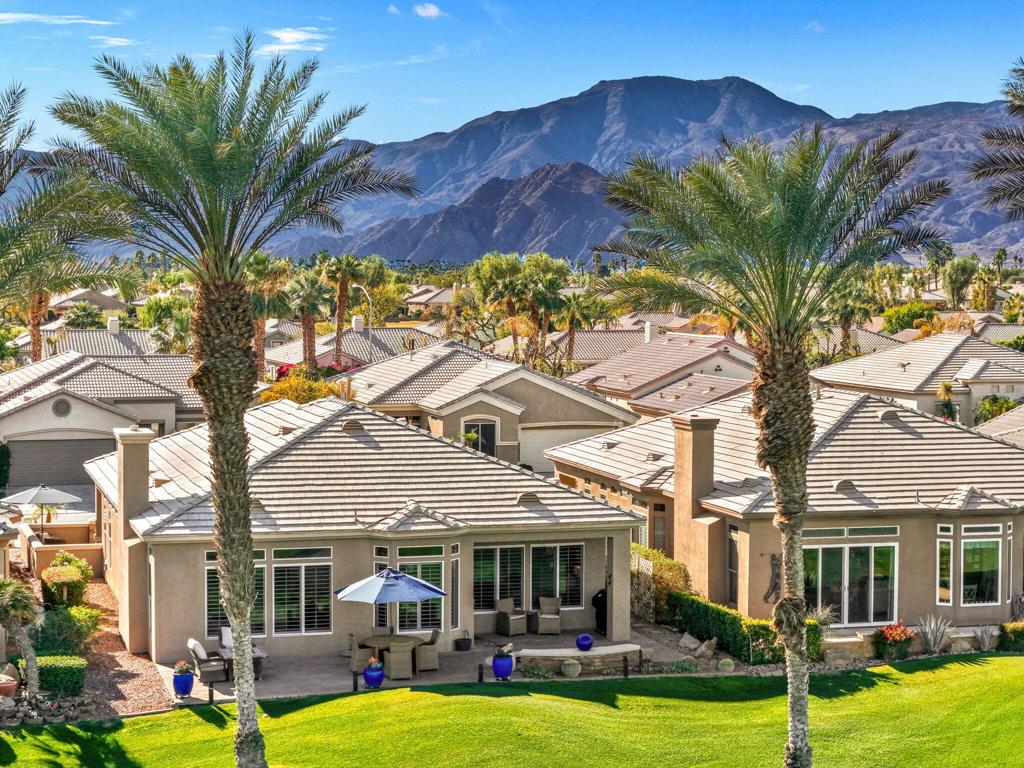 Welcome to Heritage Palms, a community for those ages 55 and over. This South Hampton model on the fairway of hole 17 sits in a the perfect spot for a 180 degree view of the Arthur Hills design course and both San Jacinto and Shadow Mountains. This wonderful open floor plan with 10 foot trayed ceilings is offered turnkey furnished and features two bedrooms, a den/office, and two bathrooms and boasts pride of ownership throughout. This impeccable home is move-in ready and has loads of wonderful updates which include a kitchen make-over with new high-end cabinetry, stainless steel appliances and granite slab counters. The spacious primary bathroom has been updated with tile shower and floors, new vanity, and two custom walk-in closets. In addition to plantation shutters on all windows, new light fixtures and ceiling fans were just added. The home gives you outdoor areas in both the front and back of the house when you are seeking sun or shade. Both patios, driveway, and walkway are finished with paver stones giving it great curb appeal and designer look. The large 10 foot sunken spool is great for those hot days when you want to cool off and for the cold nights when you want to recover from a day of golf or tennis/pickleball with friends. Outside, the yard has been updated with low maintenance, drought tolerant landscape keeping water bills low and yard work a breeze. The garage features a golf cart nook, epoxy floors and built in cabinets to keep your things clean and organized. Heritage Palms is a resident owned club and offers lots of amenities - Private golf course, pickleball, tennis, driving range, restaurant, billiards and may social clubs and activities. This is truly a fantastic home in a wonderful community that has everything you need to make moving easy. The house has been rented frequently in 2025 and is booked for five months (Nov 25 & Jan-April 2026). New owner would have option of acquiring these rentals after closing or they could also be cancelled. Call today for your private showing.