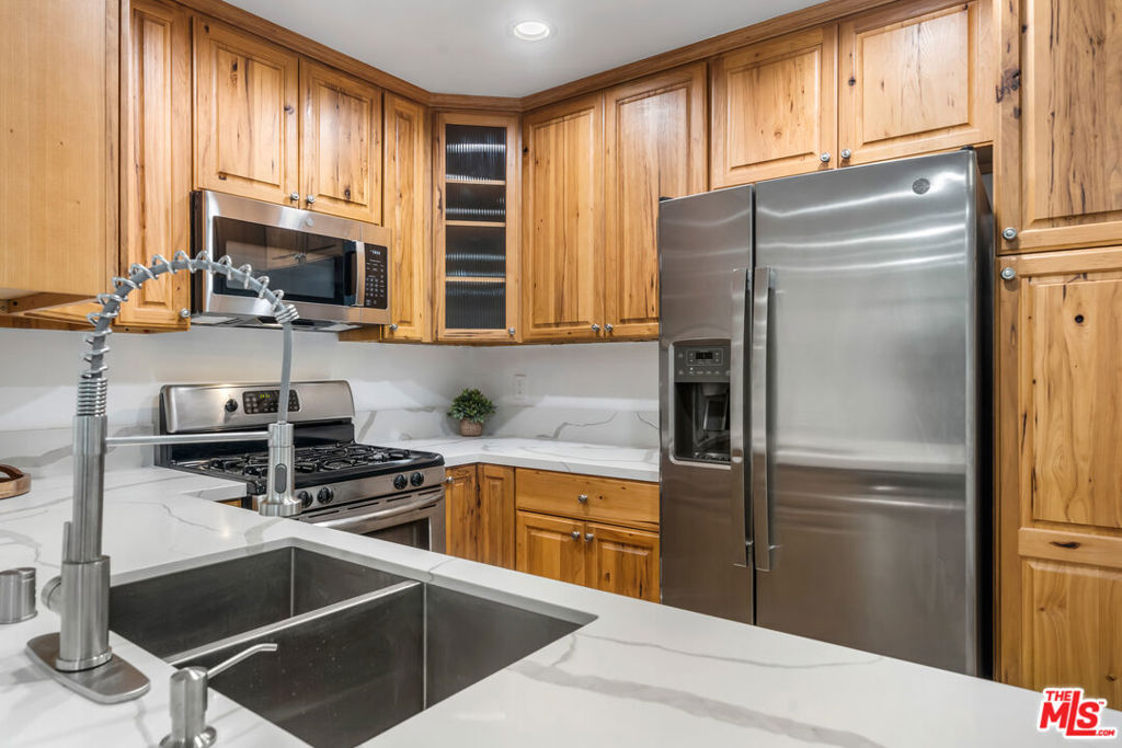 This fully remodeled open floorplan condo is on Cynthia Street in the popular Norma Triangle area of West Hollywood. The unit has a large private balcony, new kitchen countertops, newer double-pane windows, and screens. The complete renovation included smoothing out all interior walls, new recessed lighting, a new bathroom sink, and much more. There is a large walk-in closet. Washer & Dryer hook-ups are inside the unit. It is a private, west-facing condominium in a secure building with a pool and a gated underground garage with assigned parking spaces. Cooking gas, water & trash removal utilities are included in the lease. The building has a large pool, a fitness room, and a gated community garage. Convenient location steps from South of Sunset Blvd and East of Doheny Drive. Close distance to shopping, restaurants, the Sunset Strip, and Beverly Hills. West Hollywood Park, dog park, tennis courts, etc.