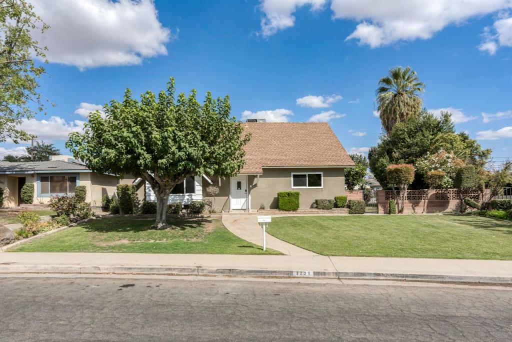 Nicely Updated Beauty in NE Bakersfield! This stunning 4-bedroom, 2-bathroom two-story home has been thoughtfully updated with modern style and smart functionality. Enjoy new windows, fresh paint, modern wood style flooring, new carpet, recessed lighting, and a bright, open layout filled with natural light. The spacious kitchen features abundant cabinetry, an oversized island, and connects seamlessly to the family room and dining area perfect for entertaining. Both bathrooms have been tastefully remodeled with features like a walk-in shower and dual vanities. Additional upgrades include newer electrical and plumbing, and a sleek sliding door that leads to a large backyard with an oversized patio ideal for relaxing, gardening, or gatherings. Located near local amenities, this move-in-ready home offers modern elegance, comfort, and convenience in one beautifully upgraded package.