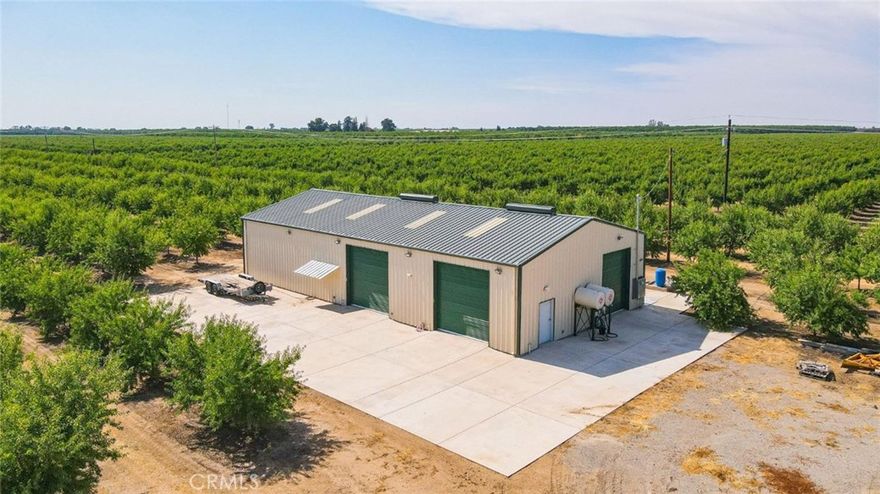 This exceptional 38-acre almond orchard, located just 15 miles from UC Merced, offers a prime opportunity for both agricultural and residential use. Ideally situated near key facilities—only 3 miles from Live Oak Packing, 6 miles from Marchini Almond Processing, 13 miles from the AutoZone Distribution Warehouse, and about an hour from Yosemite National Park—this property combines rural tranquility with accessibility. The immaculate orchard features 50% Nonpareil and 50% Monterey trees on Nemaguard rootstock, currently in their 8th leaf. A newly built 3,200 sq. ft. (40x80) shop includes a 400-amp electrical panel (200 amps for the shop and 200 amps capped for a future home). Water resources include a 650-foot deep ag well with a 100 HP electric turbine, flow meter, and 10 interim filter, plus a 310-foot domestic well (3 HP submersible) approved by Merced County for residential use. The irrigation system—fully automated with micro-sprinklers—feeds the entire orchard at once through 8 mains and 4 subsets. With 61 total rows (30 Monterey and 31 Nonpareil, 80 trees per row), this property reflects expert development and management, with orchard establishment costs estimated at $35,000 per acre (excluding the shop). The Seller pays into the Sustainable Groundwater Management Program, included in annual property taxes. The Seller also has a Sierra house plan available should the potential buyer wish to use it; buyer to investigate with the County of Merced for any requirements for use. This beautiful, productive property with a potential custom home site is perfect for a grower or investor seeking a turn-key operation near Merced.