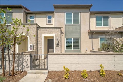 Photo of 3580 E Lantern Paseo #142, Ontario, CA 91761 (MLS # CV26098757)