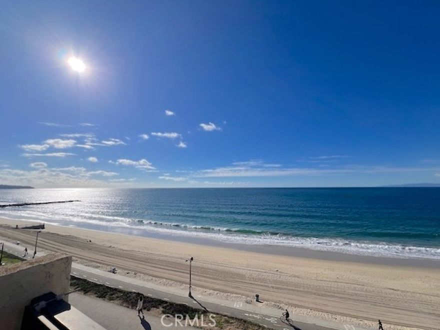 Panoramic Ocean View! Light and airy 2 bedroom and 2,5 bathroom condo in South Redondo. Just step down to the beach. New painting, new laminate floor in living, and new carpet flooring upstairs. Upgraded kitchen. A spacious west-facing deck perfect for enjoying ocean breezes and colorful sunsets, and entertaining. Conveniently located to shopping and fine dining in the Riviera Village. Great opportunity to live, by the beach. Refrigerator, washer & dryer are included without warranty.