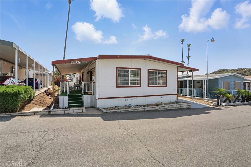Welcome To Panorama Cove Charming Hilly Serene 55+ Community close to Homeland. This 1,440 Sqft Home offers 2 Beds / 2 Baths / Living Room / Dining Room / Family Room / Laundry Area / Covered Porch / New A/C / New Furnance / New Water Heater / Carport & Shed @ a price point that will not disappoint! This place would be great to call your new home. Community only has 152 Homes, Large Clubhouse / Pool & AMAZING Views! Space Fee Includes: Water, Sewer & Trash! Come CHECK out this Home today. (Professional Photos coming tomorrow)