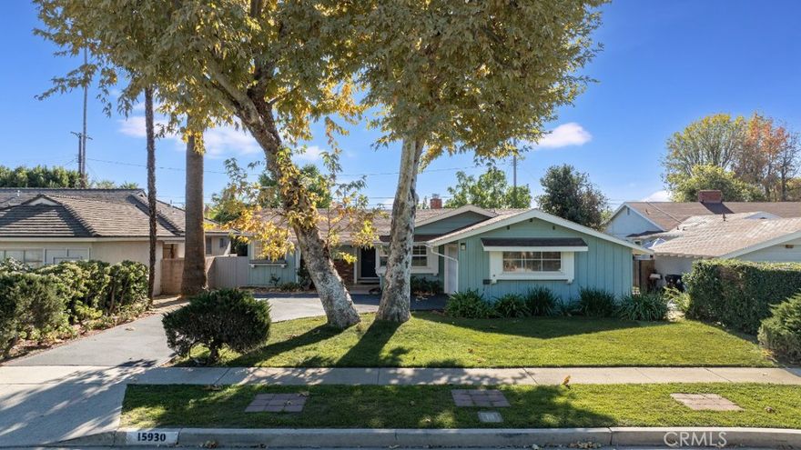 This beautifully maintained North Hills residence blends vintage character with thoughtful updates across 3 bedrooms, 2 bathrooms, and 1,791 sq ft of inviting living space. Great curb appeal with a curving drive, broad shade tree, and a covered front porch with decorative brickwork. The distinctive stained-glass front door sets the tone for the warmth inside, where hardwood floors and fresh paint throughout enhance the space with a bright and welcoming feel. A spacious living room offers a soaring, wood beamed, vaulted ceiling, a substantial curved brick fireplace, and a sliding glass door leading to an enclosed patio. A large archway with decorative columns and built-in shelving opens to the dining area, accented by a decorative wood-panel and mirrored wall. Step down into a cozy family room/sunroom, providing additional versatility in living space, with its beamed ceiling, herringbone-pattern brick flooring, and bay windows. The kitchen features tile counters and durable flooring, white cabinetry, built-in appliances, and sunny breakfast nook. Adjacent is a dedicated utility room with laundry hookups, storage, a utility sink, direct access to the side yard, and a walk-in pantry with a convenient passthrough to the family room. The primary suite is a generous space with a large walk-in closet and an en-suite, ¾ bath, with a tiled shower, along with a glass paneled opening to the enclosed patio. Down the hall, two sizable secondary bedrooms feature coved ceilings, step-in closets and share a full hall bath with tile counters and tub enclosure. A patio space with tile floors has been enclosed (without permits) to provide additional, versatile living space. Outside is a private backyard with open patio space, brick planters, and a classic kidney-shaped pool ideal for outdoor enjoyment or entertainment. The attached 2-car garage does not have direct access but can be opened with an overhead opener. Well situated within the award-winning Vintage Math/Science/Technology Magnet School vicinity with easy access to nearby shopping, dining, and major routes including the 405, 118, and 5 freeways, this home delivers comfort, character, and exceptional convenience in the heart of the Valley. Don’t miss your chance with this one!