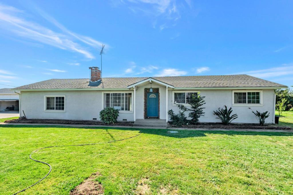 Discover the perfect blend of comfortable living and productive farmland with this serene 17.61-acre property. Planted with Nonpareil and Sonora almond trees, the land offers both beauty and income potential. The property features a well-maintained 3-bedroom, 2-bath home with over 2,168 sq. ft. of living space, providing plenty of room for family and guests. Inside, you'll find a comfortable layout designed for everyday living and relaxation.For those who need extra space for the farm equipment and toys, the property includes a large multi purpose workshop with roll up doors, a detached storage building, and a fenced front yard for animals to roam. A dedicated irrigation well supports the orchards, while the home benefits from its own domestic well and septic system. Also water provided by OID and functional micros Additional highlights include paid solar to lower utility costs, a variety of fruit trees, and wide-open surroundings that create a peaceful, country atmosphere yet the property remains conveniently located just a short drive from town.Whether your are seeking a quiet place to call home, space for farming, or a balance of both, this property offers endless opportunities in a truly tranquil setting.