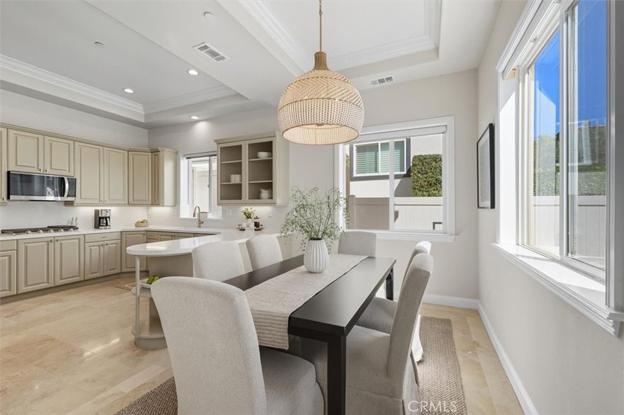 Step inside this beautifully updated Redondo Beach townhome where thoughtful upgrades and abundant natural light create a warm and welcoming retreat. The remodeled kitchen is a showpiece, featuring sleek quartz countertops, stainless steel appliances and plenty of cabinetry to keep everything organized. New flooring and designer lighting flow throughout the home, complemented by fresh interior paint that gives each space a crisp, modern feel. High ceilings, a skylight and oversized windows add to the sense of volume and brightness, while the flexible layout includes a dedicated home office for today’s work-from-home lifestyle. The spacious living room centers around a versatile fireplace with both wood-burning and gas options, providing a cozy focal point year-round. The primary suite offers a true sanctuary, complete with a private sitting area, large walk-in closet and a refreshed ensuite bathroom that includes dual vanities and a soaking tub. Updated bathrooms throughout the home reflect the same modern design aesthetic, combining function with style. Convenience is also top of mind with a full laundry room—including washer and dryer—plus an attached two-car garage with extra storage. Outdoor living is just as inviting with a landscaped private backyard designed for entertaining and relaxation. Enjoy al fresco dining on the patio with the built-in gas hookup ready for your BBQ. Perfectly positioned near award-winning schools, pristine South Bay beaches, and an array of shopping and dining options, this home blends accessibility with the laid-back beach lifestyle. Easy access to freeways and LAX makes commuting simple while still allowing you to escape to the coastal atmosphere Redondo Beach is known for. Don’t miss this rare opportunity to own a move-in ready home with modern updates, flexible living spaces and an unbeatable location.