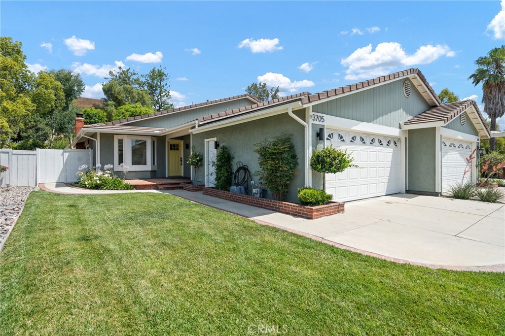 Welcome to 3705 Cypress Lane — a reimagined single-level residence tucked at the end of a quiet cul-de-sac in the heart of Yorba Linda, known as The Land of Gracious Living. Framed by gentle hills and surrounded by a sense of calm, this thoughtfully updated 2-bedroom, 2-bath home sits on an expansive 8,800 sq ft lot that invites both everyday ease and long-term potential. Step inside and you’re met with a light-filled interior where clean lines, fresh finishes, and a modern open layout create a natural flow for daily living and effortless entertaining. Every detail feels intentional—the design and finishes are cohesive and timeless, blending warmth and contemporary style for a comfortable, polished look. The cozy fireplace nestled between the living room and dining area sets the perfect scene for warm dinners, relaxing evenings, watching a movie, or simply enjoying your favorite glass of wine with family and friends. The kitchen, living, and dining spaces connect seamlessly, offering warmth, character, and flexibility. Two well-sized bedrooms and two updated bathrooms complete the interior with comfort and simplicity. Step outside and the experience continues—a beautifully landscaped backyard oasis designed for relaxation and gathering. Whether you’re hosting summer dinners, unwinding in the evening breeze, or envisioning what’s next, the possibilities are wide open. Build a pool and spa, design a detached ADU, or expand the home itself—the space is there, and so is the opportunity. Just minutes from Black Gold Golf Club, scenic hiking trails, the Richard Nixon Library, Yorba Linda Town Center, top-rated schools, and the shops and restaurants of Savi Ranch, this home is ideally located for those who value both convenience and tranquility. 3705 Cypress Lane isn’t just a home—it’s a gateway to gracious living.